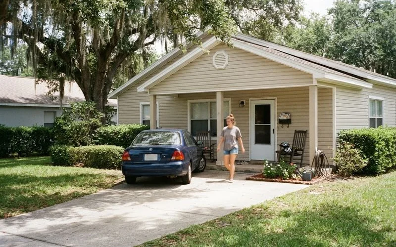 A well maintained home with clean vinyl siding and manicured landscaping presents strong curb appeal for a real estate listing